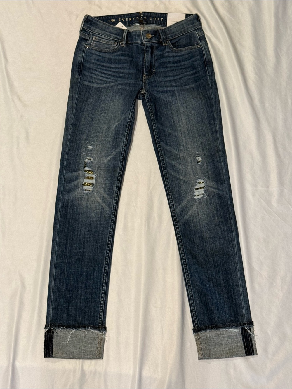 White House Black Market navy blue mid-rise slim distressed jeans